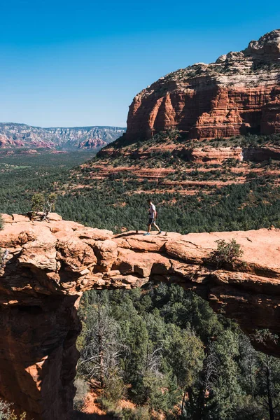 stock image Young man observing view over Grand Canyon, Arizona, USA.