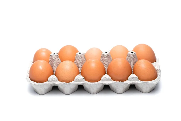Tien Eieren Verpakt Een Kartonnen Doos Een Witte Achtergrond — Stockfoto
