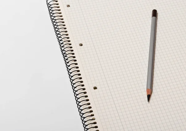 White Checked Notebook Gray Pencil White Background — Stock Photo, Image