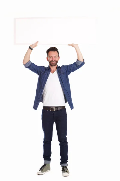 Handsome mature man holding blank billboard — Stock Photo, Image