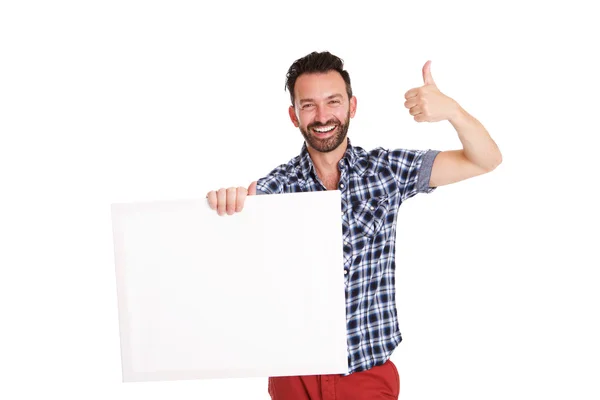 Zelfverzekerde volwassen man bezit leeg poster — Stockfoto