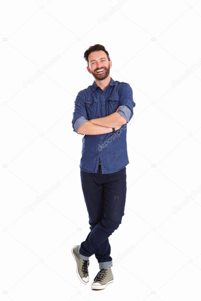 Relaxed mature man standing with arms crossed