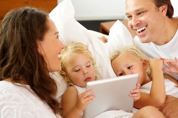 Happy parents with daughters — Stock Photo, Image