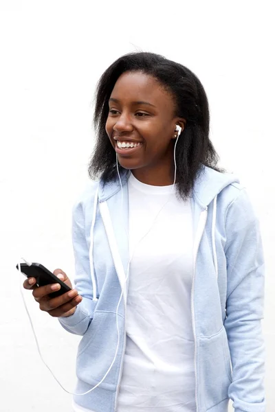 Woman listening music from smartphone — Stock Photo, Image