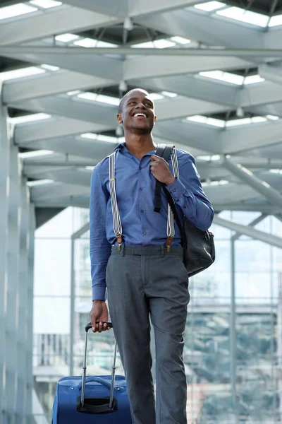 Young traveling businessman with suitcase — Stock Photo, Image