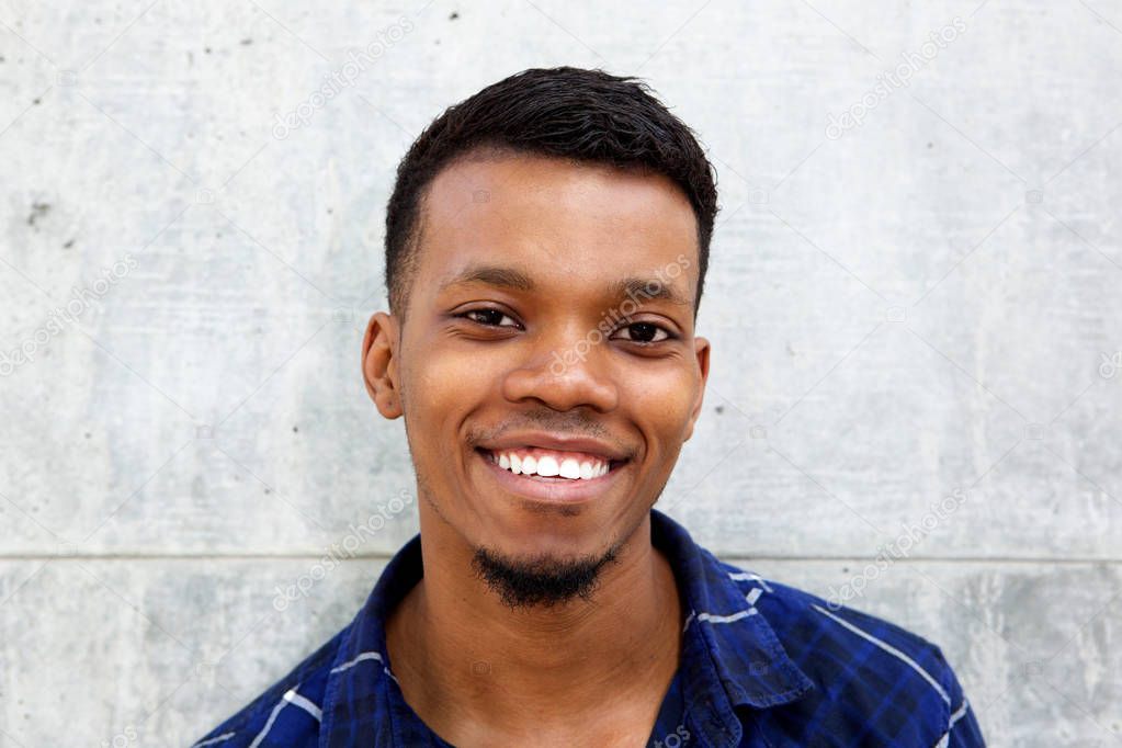 Young black man smiling 