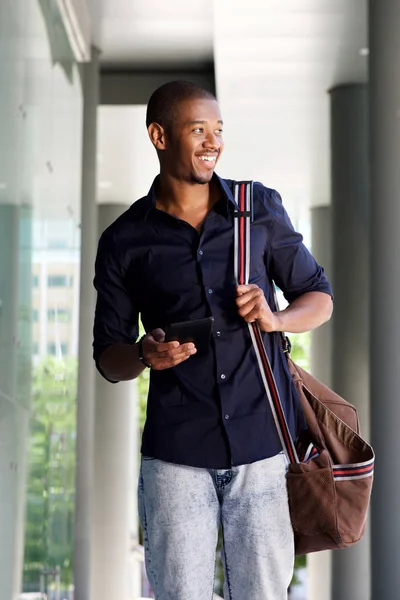 Šťastný muž s taškou — Stock fotografie