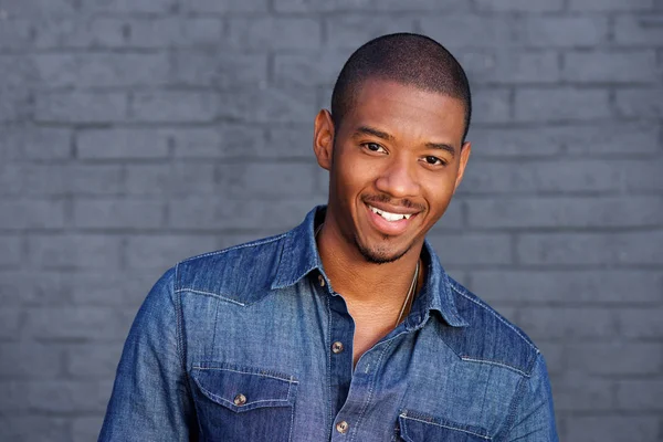 Black guy smiling at camera Stock Photo