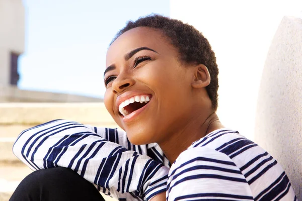 Woman laughing outside — Stock Photo, Image