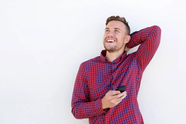 Homem rindo com telefone celular — Fotografia de Stock