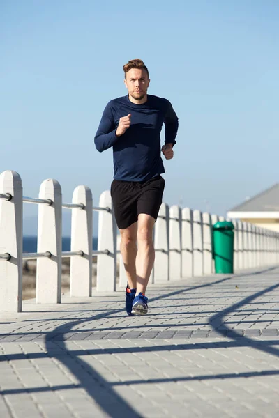 Active young man running — Stock Photo, Image