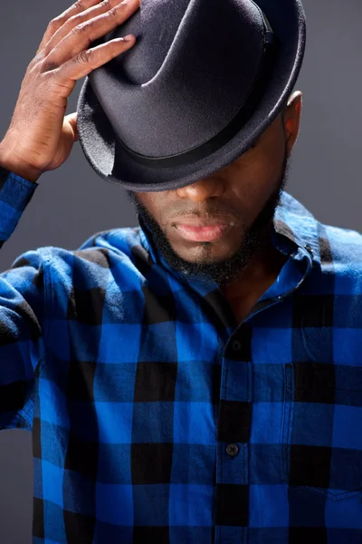 Man with hat looking down — Stock Photo, Image