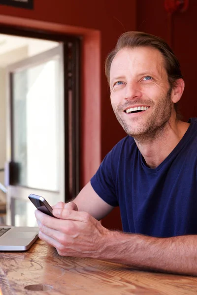 Handsome man with phone — Stock Photo, Image