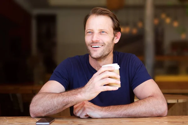 Man with coffee at cafe — Stock Photo, Image