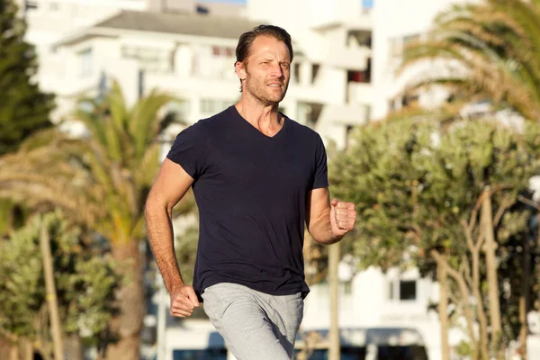 Healthy man jogging — Stock Photo, Image