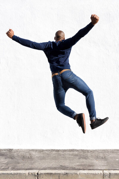man jumping in air 
