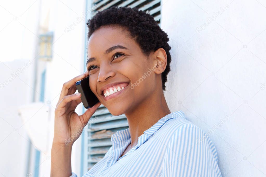 woman smiling with cellphone