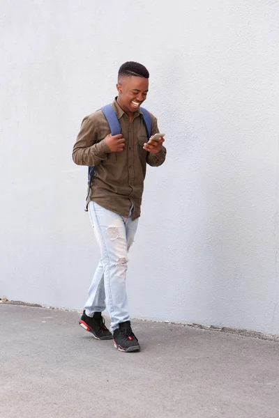 Male student walking — Stock Photo, Image