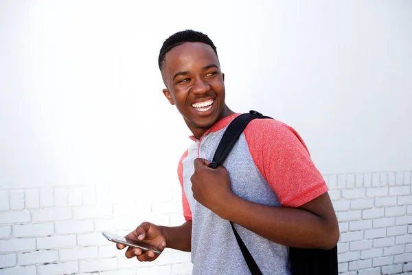 Estudante andando com saco — Fotografia de Stock