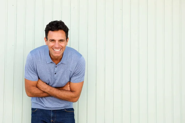 Man laughing with arms crossed — Stock Photo, Image