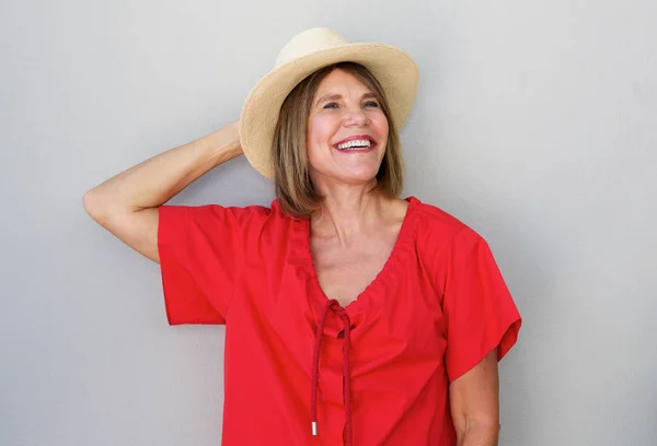 Woman laughing with hat — Stock Photo, Image