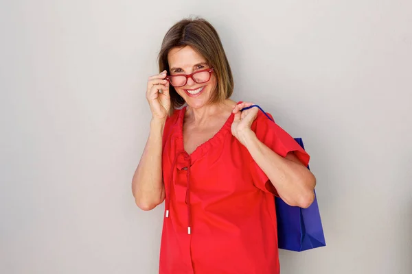 Woman with glasses and bag — Zdjęcie stockowe