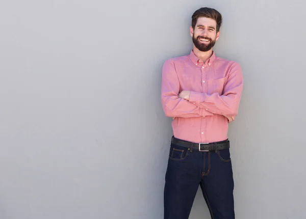 Man standing with arms crossed — Stock Photo, Image