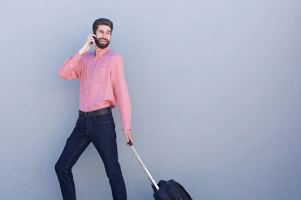 Man walking with suitcase — Stock Photo, Image