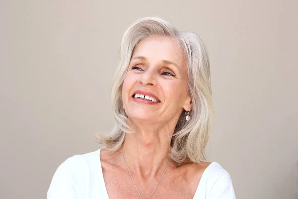 Happy senior woman smiling — Stock Photo, Image