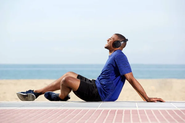 Coureur appréciant la musique — Photo