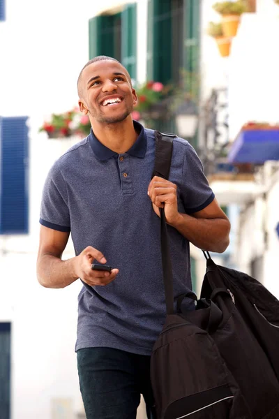 Happy male traveler walking — Stock Photo, Image