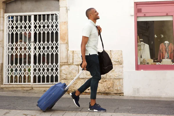 traveler walking on street