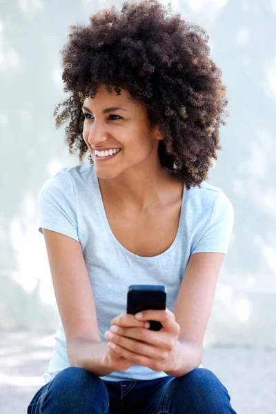 Mujer con el pelo rizado — Foto de Stock