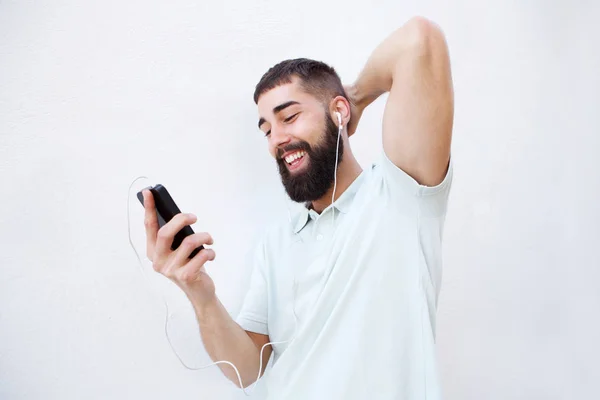 Homem alegre com fones de ouvido — Fotografia de Stock