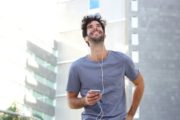 Hombre alegre caminando en la ciudad —  Fotos de Stock