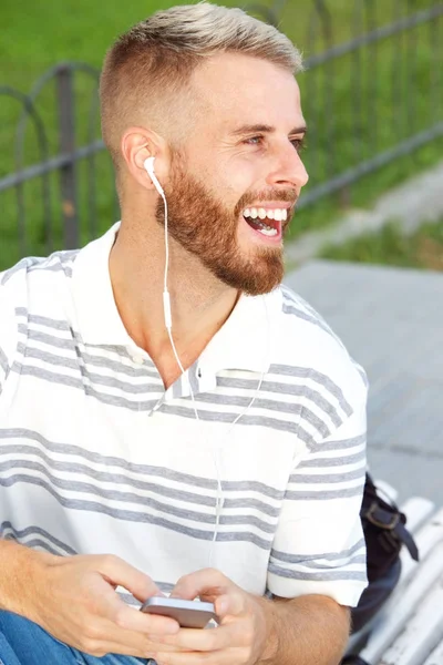 Portrait Happy Young Man Listening Music Smart Phone Earphones — Stock Photo, Image
