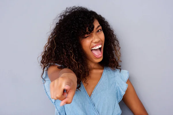 Close Portrait Beautiful Young African American Woman Winking Pointing Finger — Stock Photo, Image