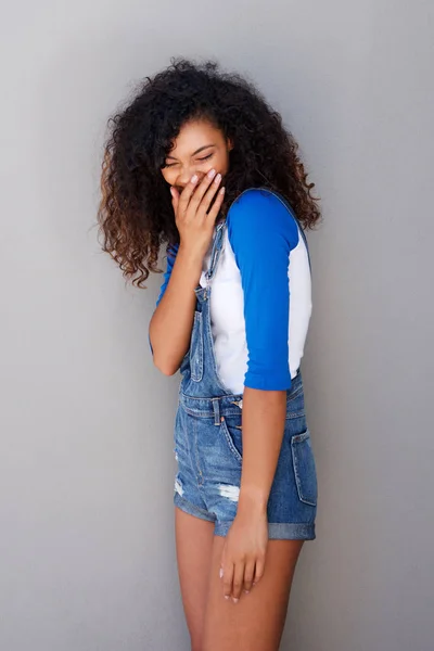 Portrait Happy Young African American Woman Giggling Gray Wall — Stock Photo, Image