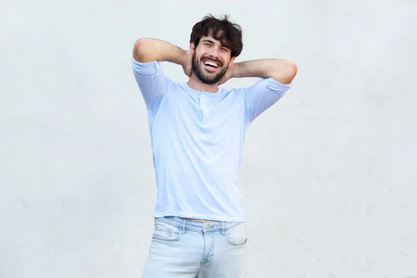 Portrait Cool Guy Laughing Hands Head White Wall — Stock Photo, Image
