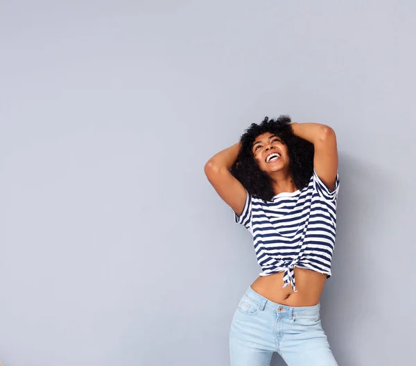 Portrait Cool African American Woman Smiling Hands Head Gray Background — Stock Photo, Image