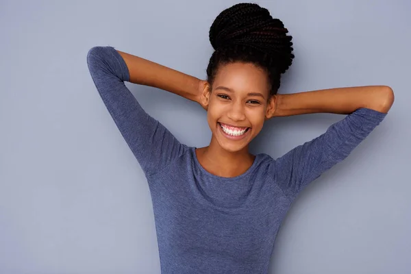 Portrait Cheerful Young Black Girl Hands Head Smiling Gray Background — Stock Photo, Image