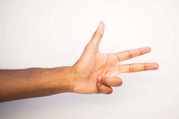 Beyaz Arka Planı Işaret Eden Parmağıyla Afro Amerikan Erkek Kolunu — Stok fotoğraf