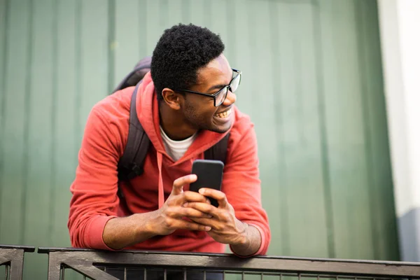 Portrait Young African American Man Glasses Mobile Phone Looking Away — Stock Photo, Image