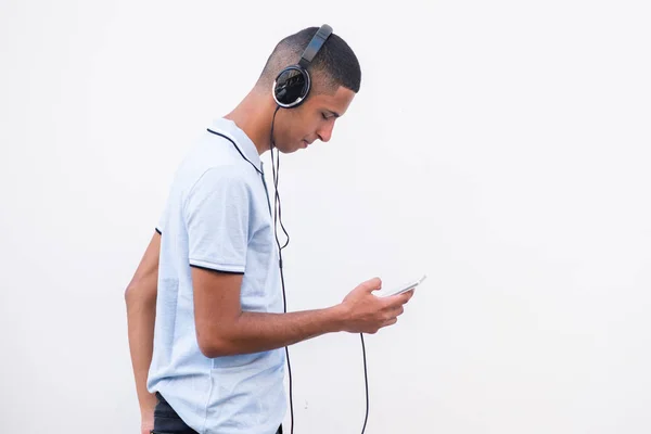 Side Portrait North African Man Listening Music Headphones Mobile Phone — Stockfoto