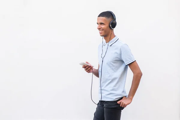 Side Portrait Young North African Man Listening Music Headphones Cellphone — Stock Photo, Image