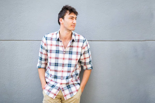 Portrait Handsome Young Man Posing Gray Wall Looking Away — Stock Photo, Image