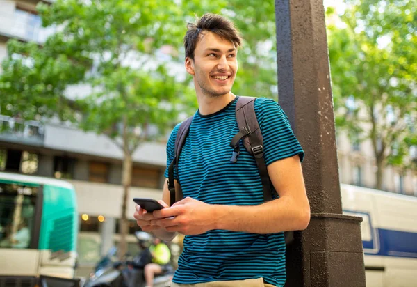 Portrait Smiling Young Man City Holding Mobile Phone Hand — Stock Photo, Image