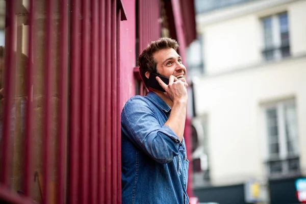 Side Portrait Happy Man Leaning Wall Talking Mobile Phone Ion — Stock Photo, Image