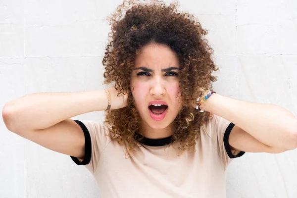 Close Portrait Young Woman Hands Curly Hair Mouth Open Unhappy — Stock Photo, Image