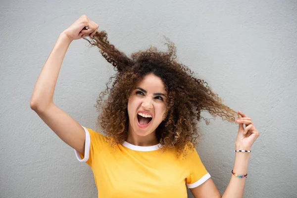 Close Portrait Young Woman Holding Curly Hair Hand Shouting — Stock Photo, Image